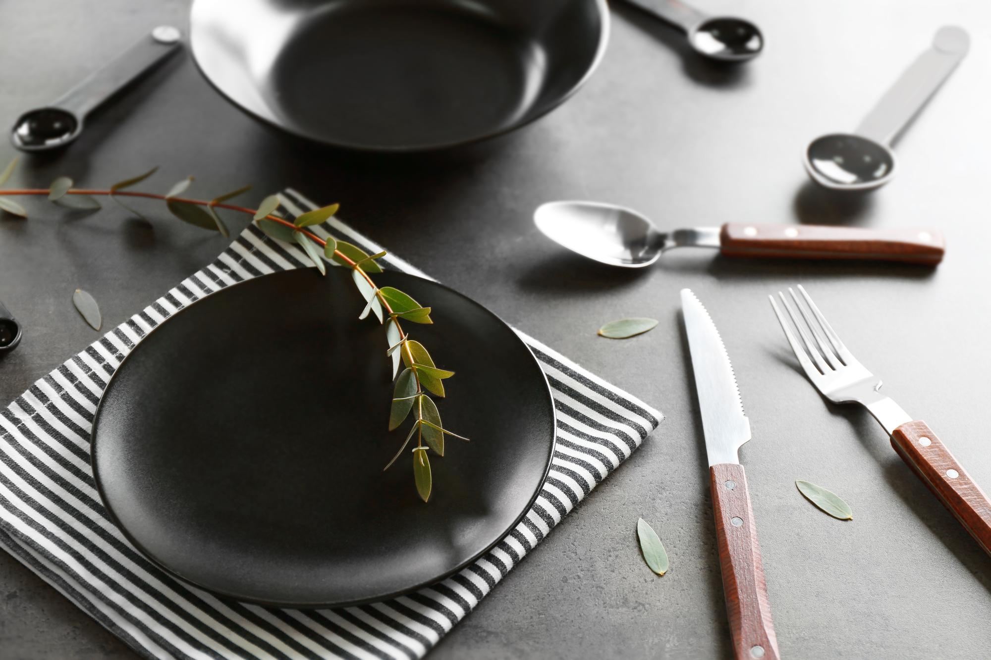 Table with plated dishes and utensils